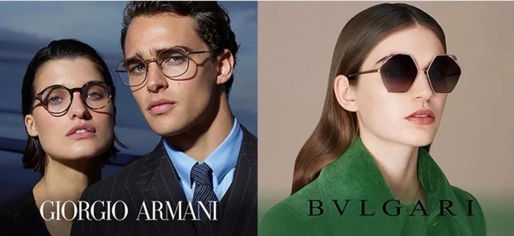 A man and woman wearing glasses with the words " armani " on them.