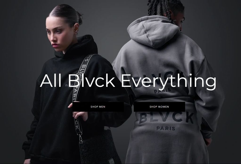 A black hoodie with the words " all blvck everything ".