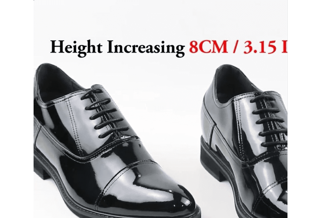 A pair of black shoes with the height increasing 8 cm.