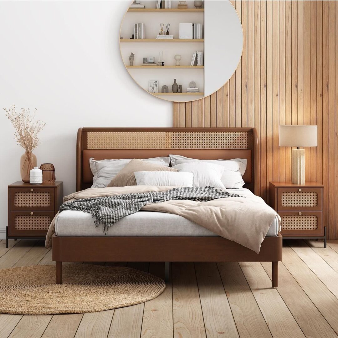 A bed room with a wooden headboard and two night stands